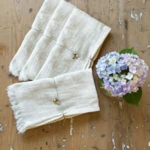 Cream cloth napkins with fringe, set of 4. 100% cotton, reusable and machine washable dinner napkins (16.5" x 16.5") perfect for everyday meals, brunch, holidays and eco-friendly table décor.